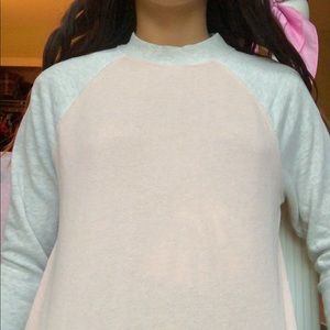 cream and gray sweatshirt